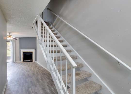 the stairway up to the second floor of a house