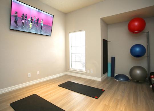 yoga room at Foxborough Apartments, Irving, TX