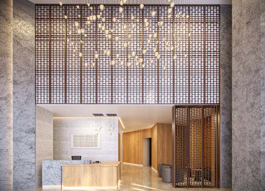 A reception area with a wooden partition and a reception desk.