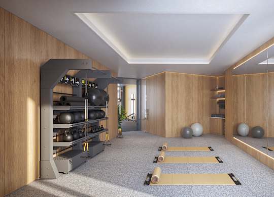 A yoga studio with wooden walls and a mirror on the right side.