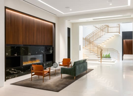 lobby with seating and fireplace at the grace apartments in arlington, va