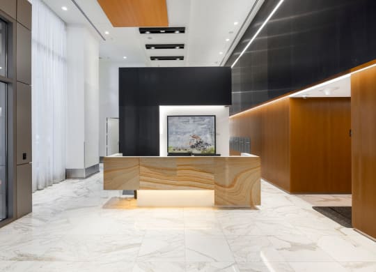 a reception desk in a lobby of a building