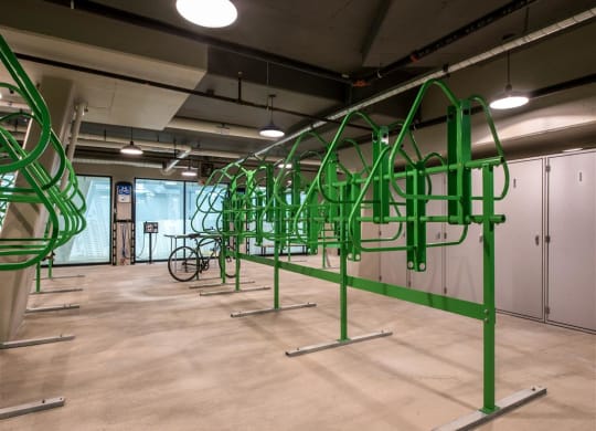 a row of green pipes in a room