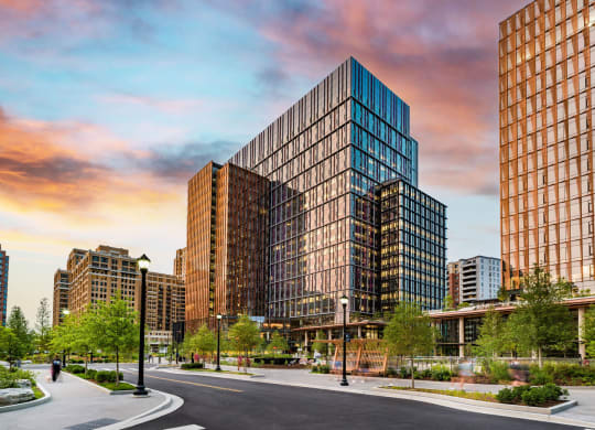 a rendering of a city street with tall buildings  at The Grace and Reva, Arlington, Virginia