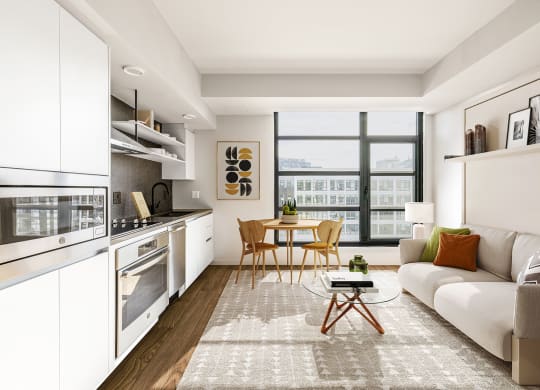 a kitchen and living room in a 555 waverly unit