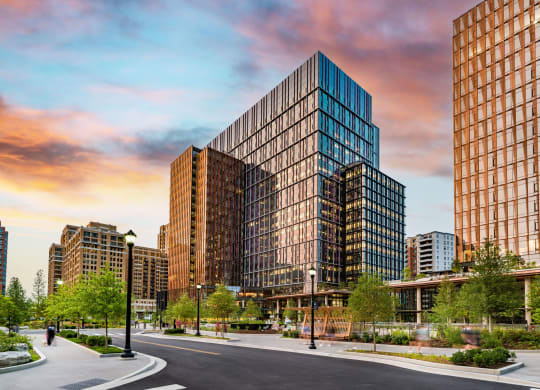 a rendering of a city street with tall buildings