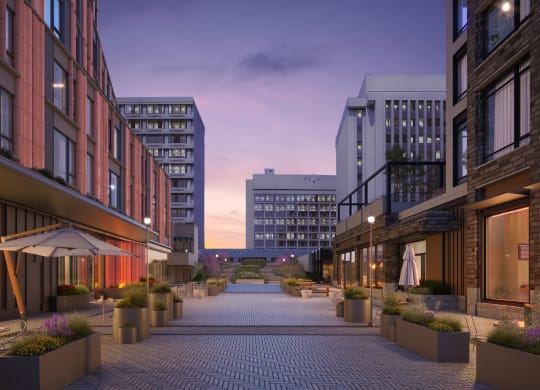 a rendering of a city street at dusk at The Grace and Reva, Virginia, 22202