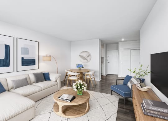 a living room with a white couch and a coffee table