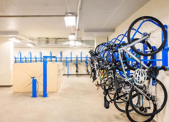 A bike parking area with bikes on racks.