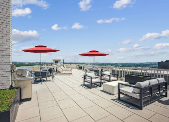 the rooftop terrace at the clarion hotel with umbrellas