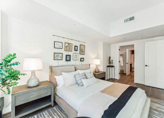 a bedroom with a large bed and a large window at The Grace and Reva, Arlington, VA, 22202