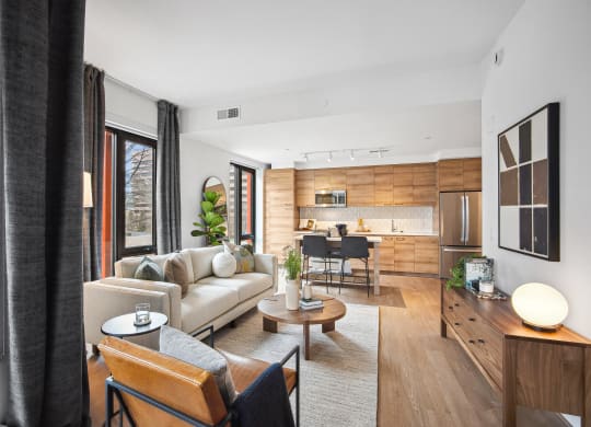 a living room with a couch and a table at The Grace and Reva, Arlington, Virginia