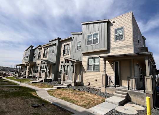 Apartment Exterior with balconies at The Townhomes at Pine Drive, Colorado