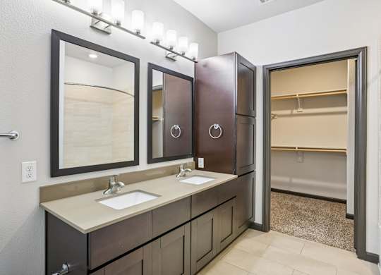 A bathroom with a vanity and a toilet.