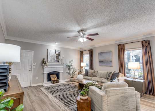 A living room with a fireplace and a couch.