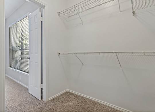 View into bedroom from walk-in closet