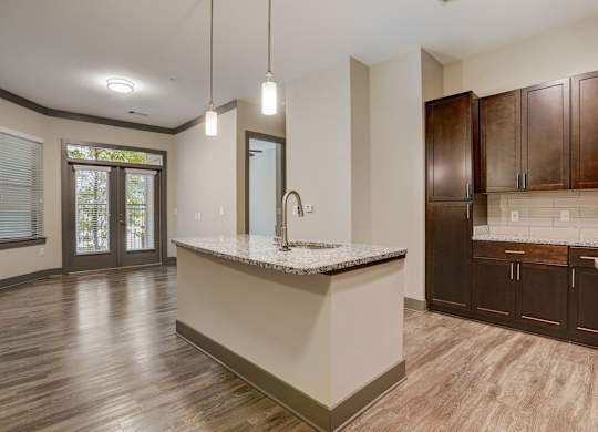 Pet-Friendly Apartments in Nashville, TN- Octave Apartments- Kitchen Island with granite countertops