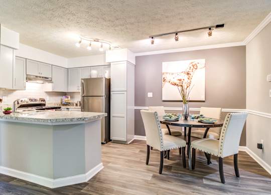 Pet Friendly Apartments in Roswell, GA - 2200 Big Creek Apartments - Dining Room and Kitchen Area