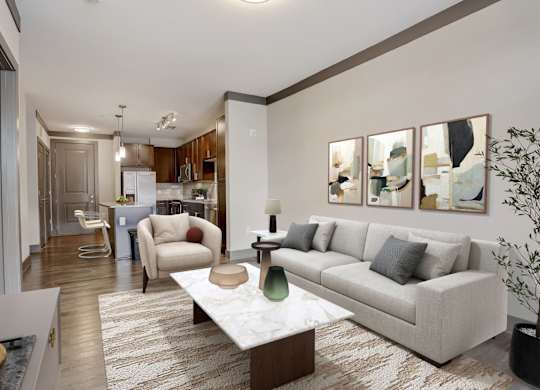 Nashville Apartments - Octave Apartments - beautifully furnished living room and wood style flooring and open style concept floorplan