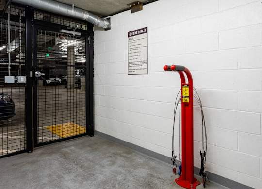 Pet-Friendly Apartments in Nob Hill Portland, OR - The Cordelia - Parking Garage with Bike Repair Center, Gated Entry, and Outlets