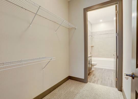 Pet-Friendly Apartments in Nashville, TN- Octave Apartments- large walk in closet with built in racks