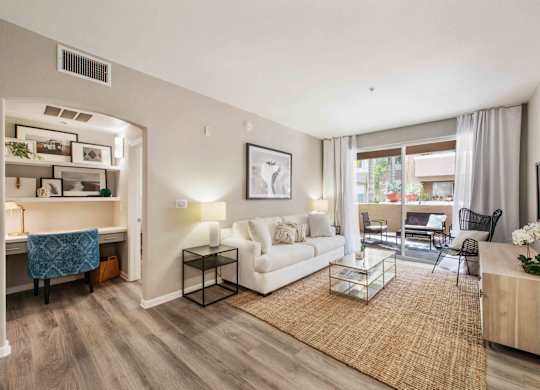 1 Bedroom Urban Apartments in Camarillo, CA - Allure - Living Room with Wood-Style Flooring, an Office Space, and Access to a Private Patio/Balcony
