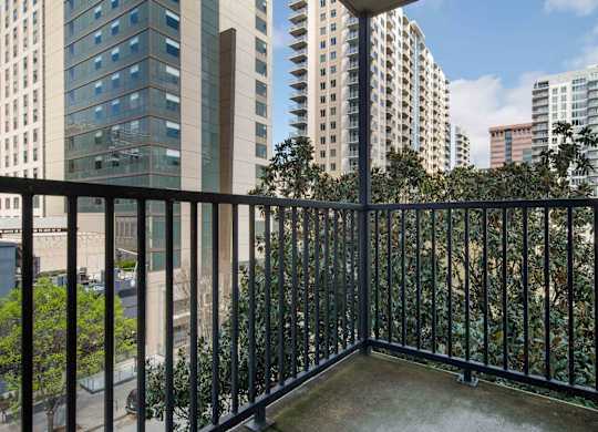 Atlanta, GA Apartments - Biltmore at Midtown - Patio with Views of Midtown