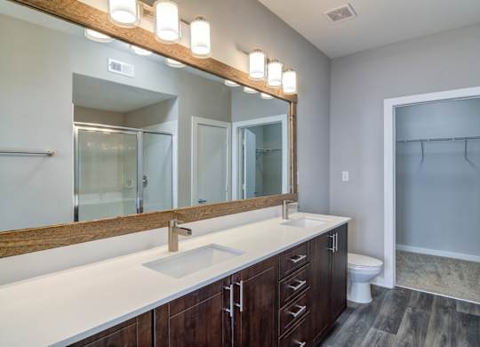 Atlanta, GA Apartments - Biltmore at Midtown -Luxury Bathroom with Large Vanity and Storage Space