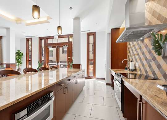 a large kitchen with an island and a counter top