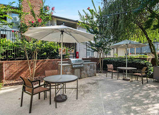 Glen Lake Apartments in Atlanta, GA 30328 photo of a bbq and picnic tables
