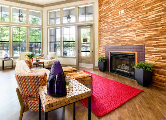resident clubhouse with an internet café and cozy fireplace