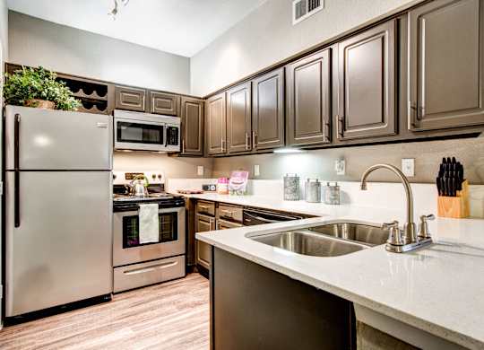 updated kitchen with stainless steel appliances