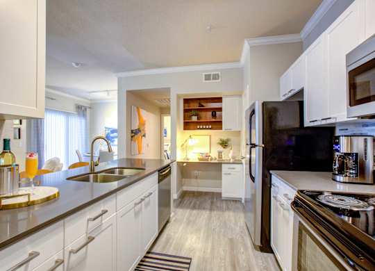 North Phoenix AZ Apartments for Rent - Fully Equipped Kitchen with Modern Interiors and Convenient Amenities Such As Fridge, Stove, and Microwave