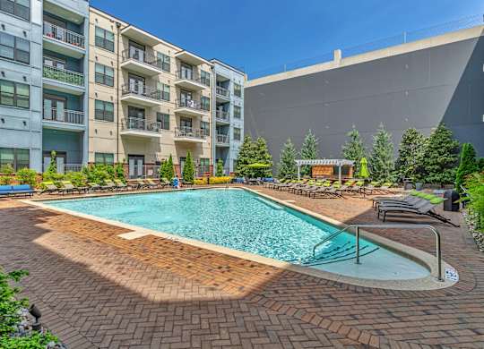 Nashville Apartments - Octave Apartments - Luxury Resort Style Swimming Pool with sundeck and loungers