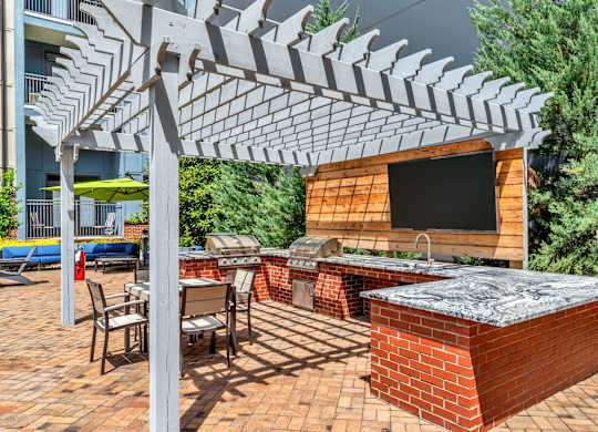Pet-Friendly Apartments in Nashville, TN- Octave Apartments-  outdoor kitchen