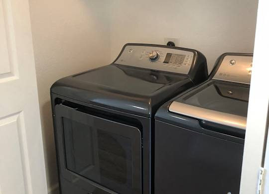Apartments for Rent in Walnut Creek - Ivy Hill - An interior shot of the in-unit full size washer/dryer