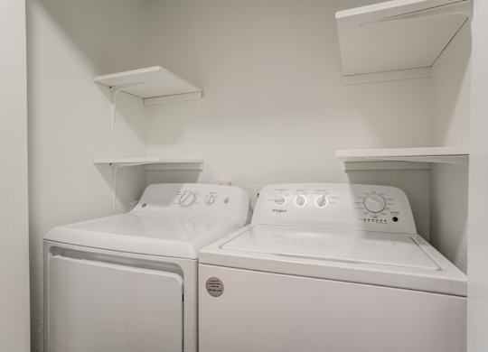 a washer and dryer in a laundry room
