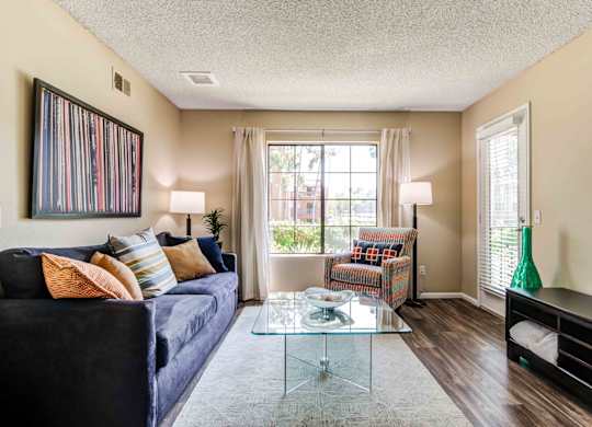 1-Bedroom Apartments in La Jolla, CA - Mirada at La Jolla Colony - Spacious Living Room with Wood-Style Flooring and a Large Window