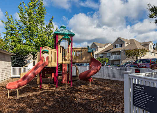 Orchards Apartments Marlborough ma apartment loft style apartments photo of outdoor playground with white fence