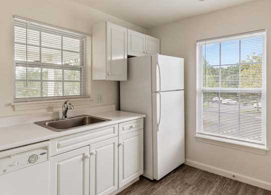 Orchards Apartments Marlborough ma apartment loft style apartments photo of kitchen with white appliances and white cabinets with wood floors and large window
