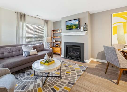 Orchards Apartments Marlborough ma apartment loft style apartments photo of living room with fireplace and large windows and modern furniture