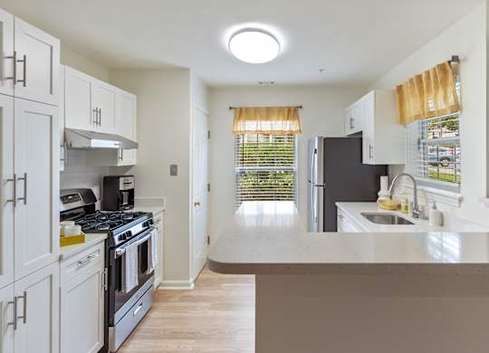 Orchards Apartments Marlborough ma apartment loft style apartments photo of kitchen stainless steel appliances with wood floor and counter tops