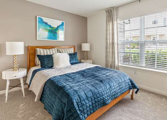 Orchards Apartments Marlborough ma apartment loft style apartments photo of large bedroom with windows and carpet with modern furniture