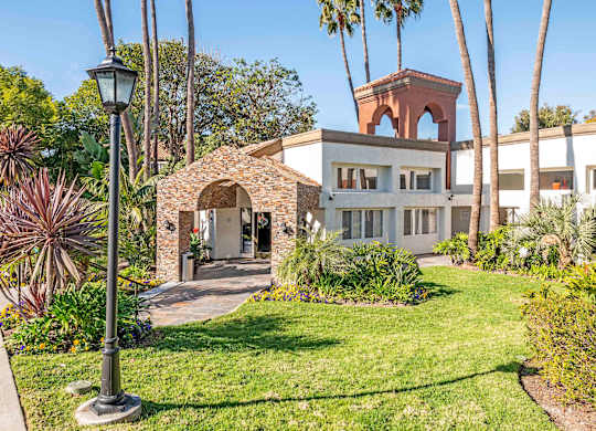 San Clemente, CA Apartments - Exterior View of Rancho Del Mar Apartments Building Surrounded By Lush Landscaping