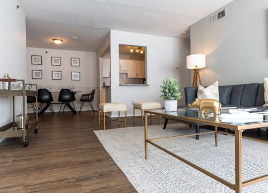 Apartments in Alpharetta, GA for Rent – Webb Bridge Crossing – living room with hardwood flooring and view of dining room