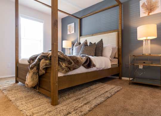 Pet-Friendly Apartments in Alpharetta, GA – Webb Bridge Crossing – bedroom with plush carpeting