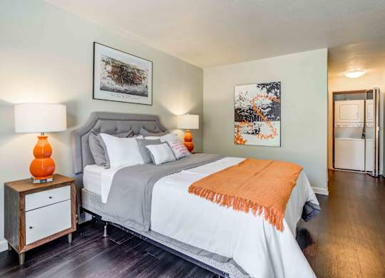 Walnut Creek, CA Apartments - Park Lake At Walnut Creek - Spacious Bedroom With Hardwood Floors And Closet With Washer And Dryer