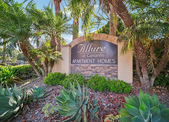 the sign at the entrance to allure apartments