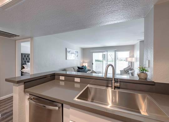 Apartments for Rent in San Clemente- Rancho Del Mar - Kitchen with Brushed Nickel Hardware & Fixtures and Hardwood-Inspired Flooring