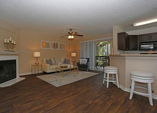 Stonegate Apartments in Palm Harbor, FL photo of living room with fireplace